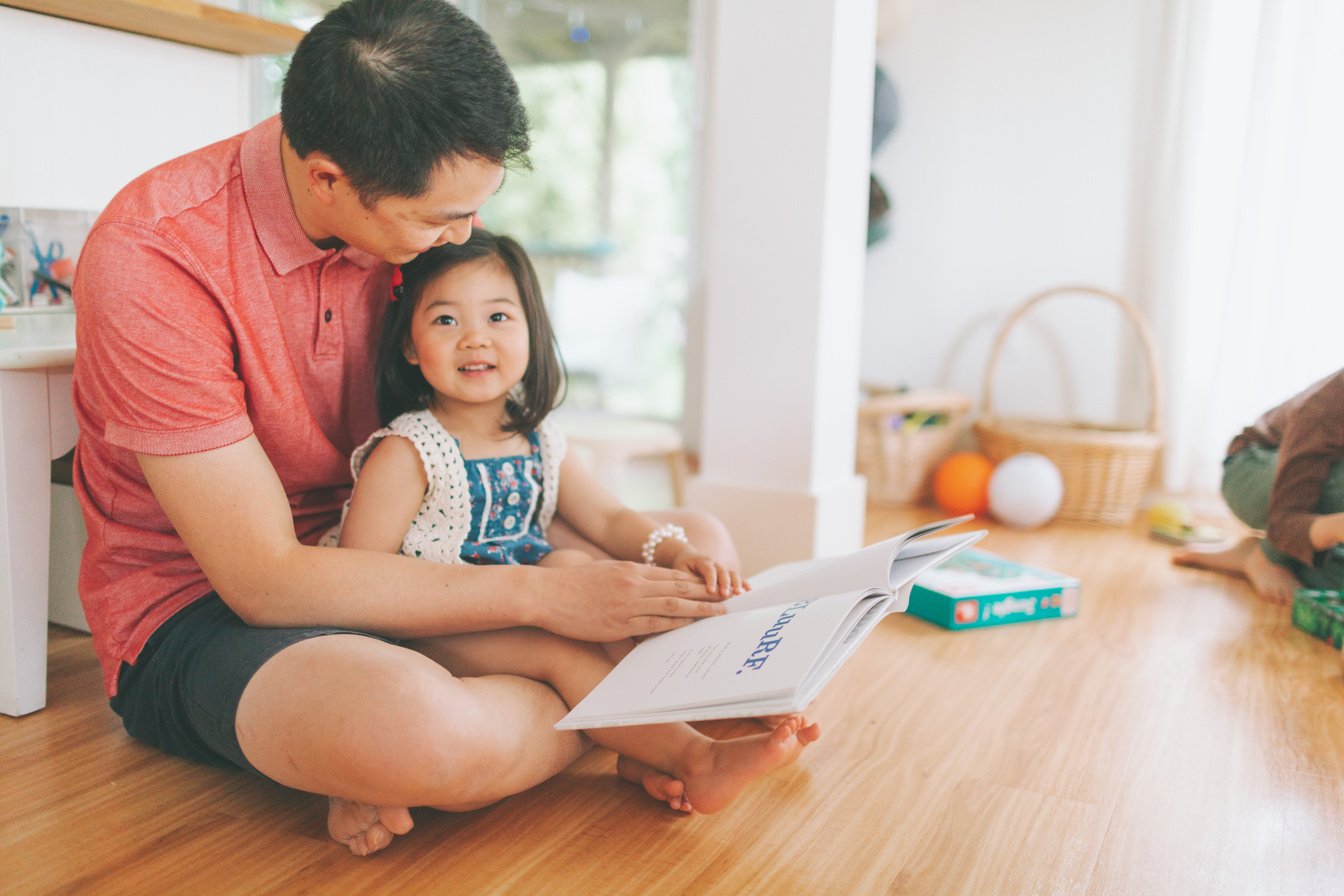 Father Reading to His Daughter